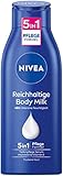 NIVEA Reichhaltige Body Milk (400 ml), intensiv pflegende Körpercreme mit Mandelöl natürlichen Ursprungs, Lotion mit Tiefenpflege Serum und Vitamin E