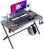 ODK Gaming Tisch mit Kohlefaser 115 x 60cm, Computertisch mit Kopfhörerhaken und Getränkehalter, ergonomischer PC Gaming Tisch, Stabiler Metallrahmen, schwarz