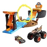 Hot Wheels GYN01 - Monster Trucks Stunt Reifen Spielset mit Startrampe, 1 Hot Wheels-Auto im Maßstab 1:64 und 1 Monster Truck, Spielzeug Autorennbahn für Kinder ab 4 Jahren